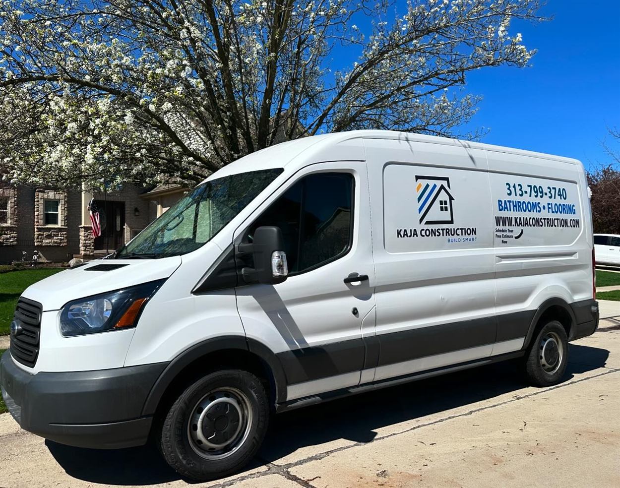 A Kaja Construction van outside a Metro Detroit home